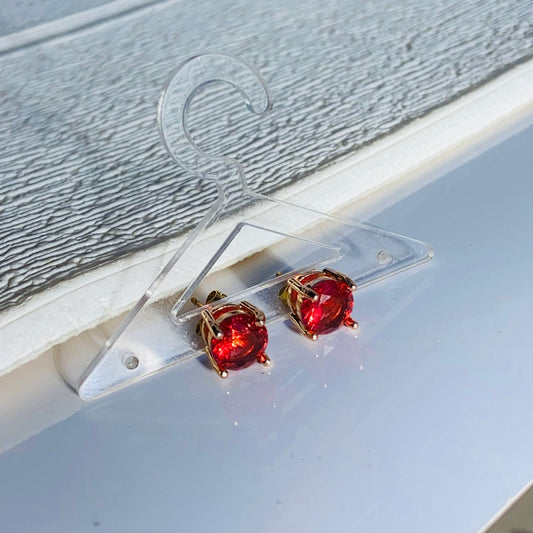 Ruby Oval Solitaire Studs •