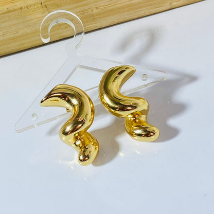 Twist Earrings •