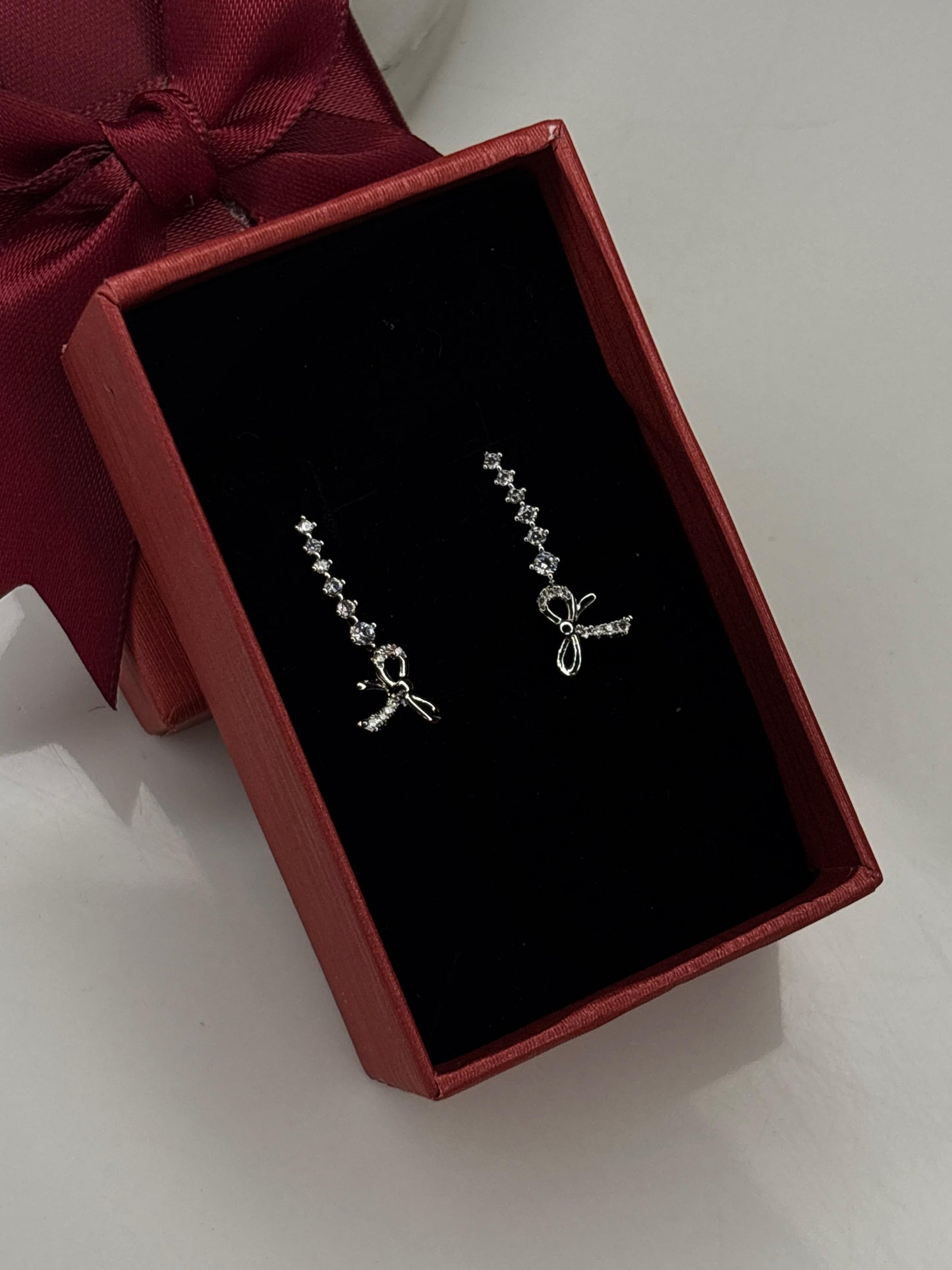 Bow Climber Silver Earrings